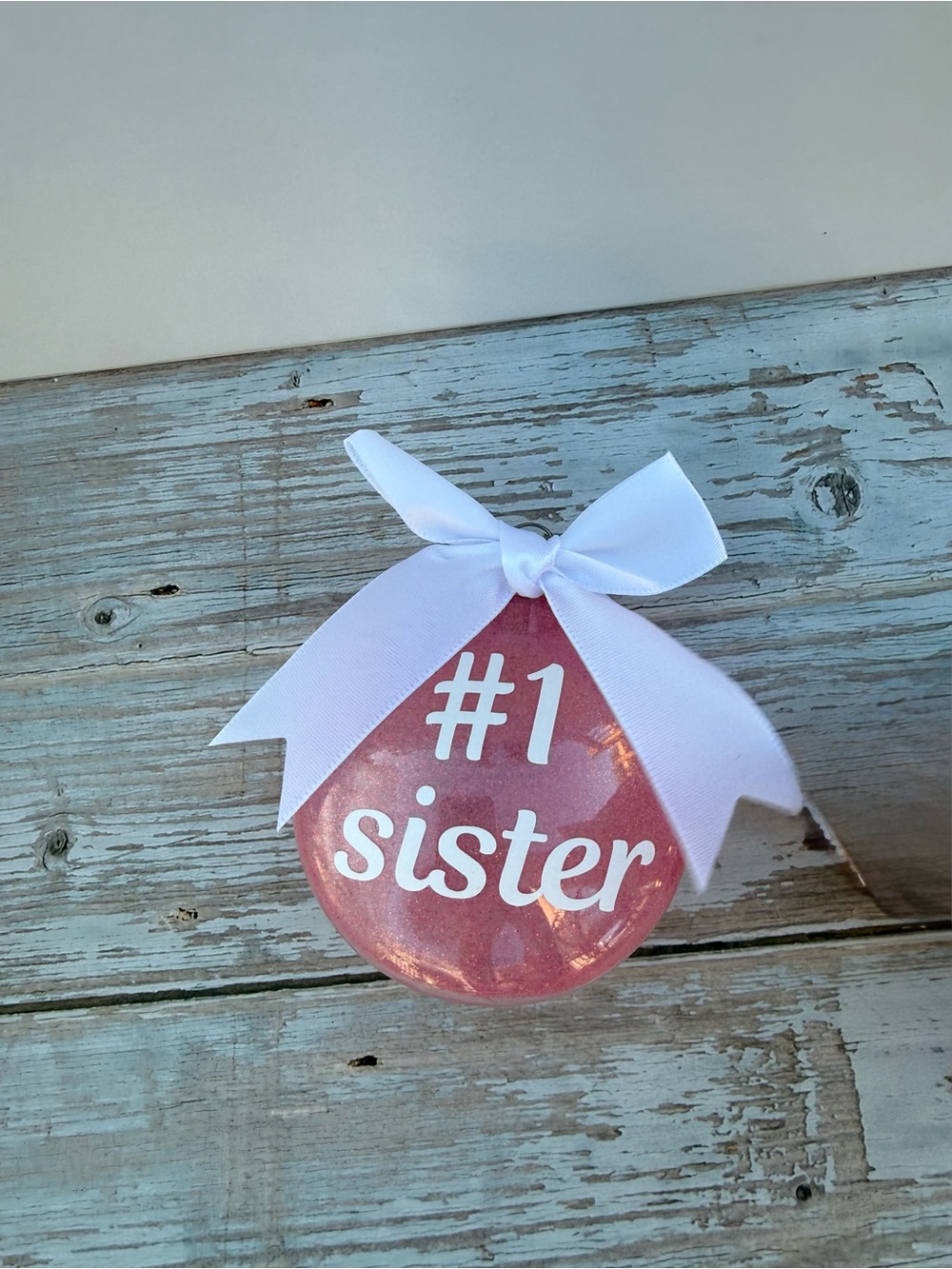 NEW #1 Sister Pink Ornament with White Bow, 3” disc ornament